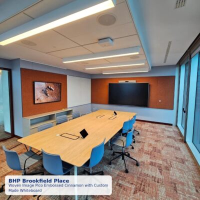 Boardroom lined with Woven Image Pico Embossed Cinnamon acoustic wall panels and suspended ceiling rafts at BHP Brookfield Place, Perth