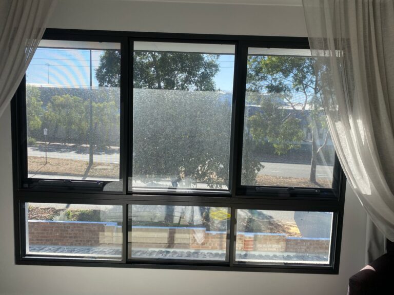 Six-panel sliding windows — street-facing home