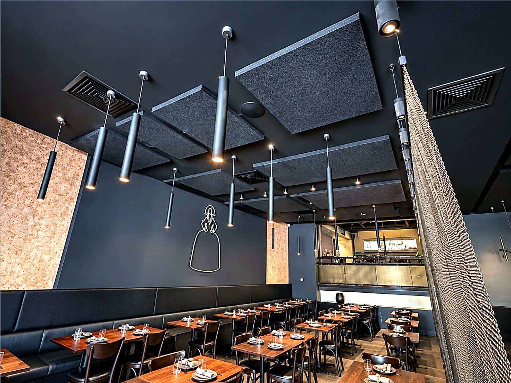Acoustic ceiling panels at Meninas Grill, Highgate, installed by Quash Soundproofing.