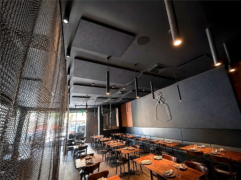 Meninas Grill dining room in Highgate, with acoustic ceiling panels by Quash Soundproofing.